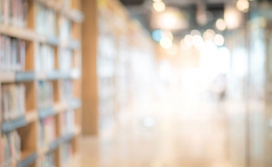 Lightened image of a library hallway.